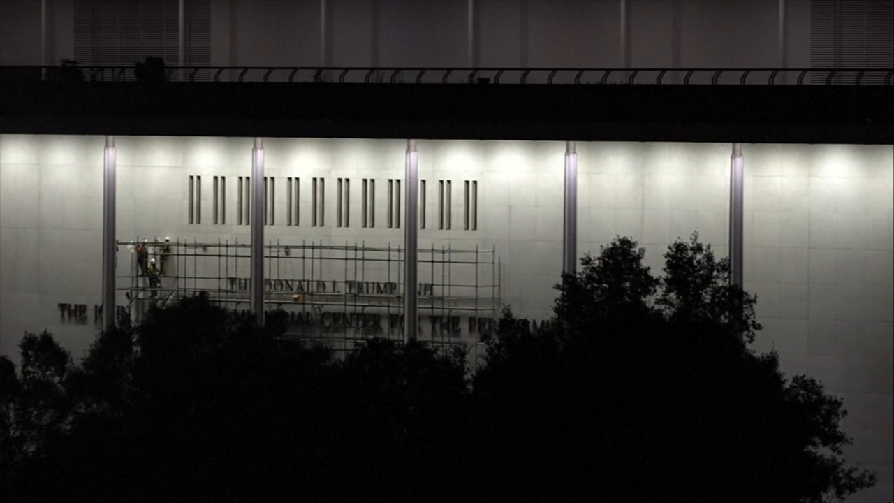 Workers begin removing Trump's name from the Kennedy Center, hours after a court-ordered deadline