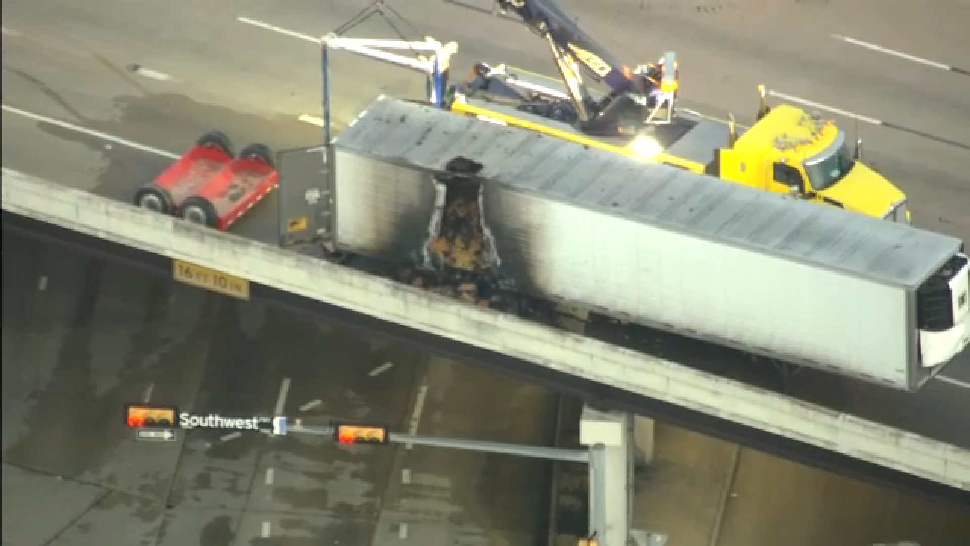 18-wheeler fire aftermath slowing down drivers along Southwest Freeway northbound at Bellaire