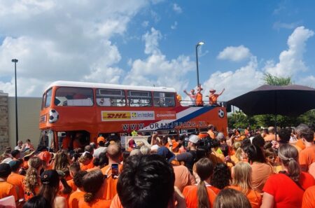 Netherlands soccer fans brave heat for glimpse of iconic Dutch Orange Bus ahead of World Cup match in Houston