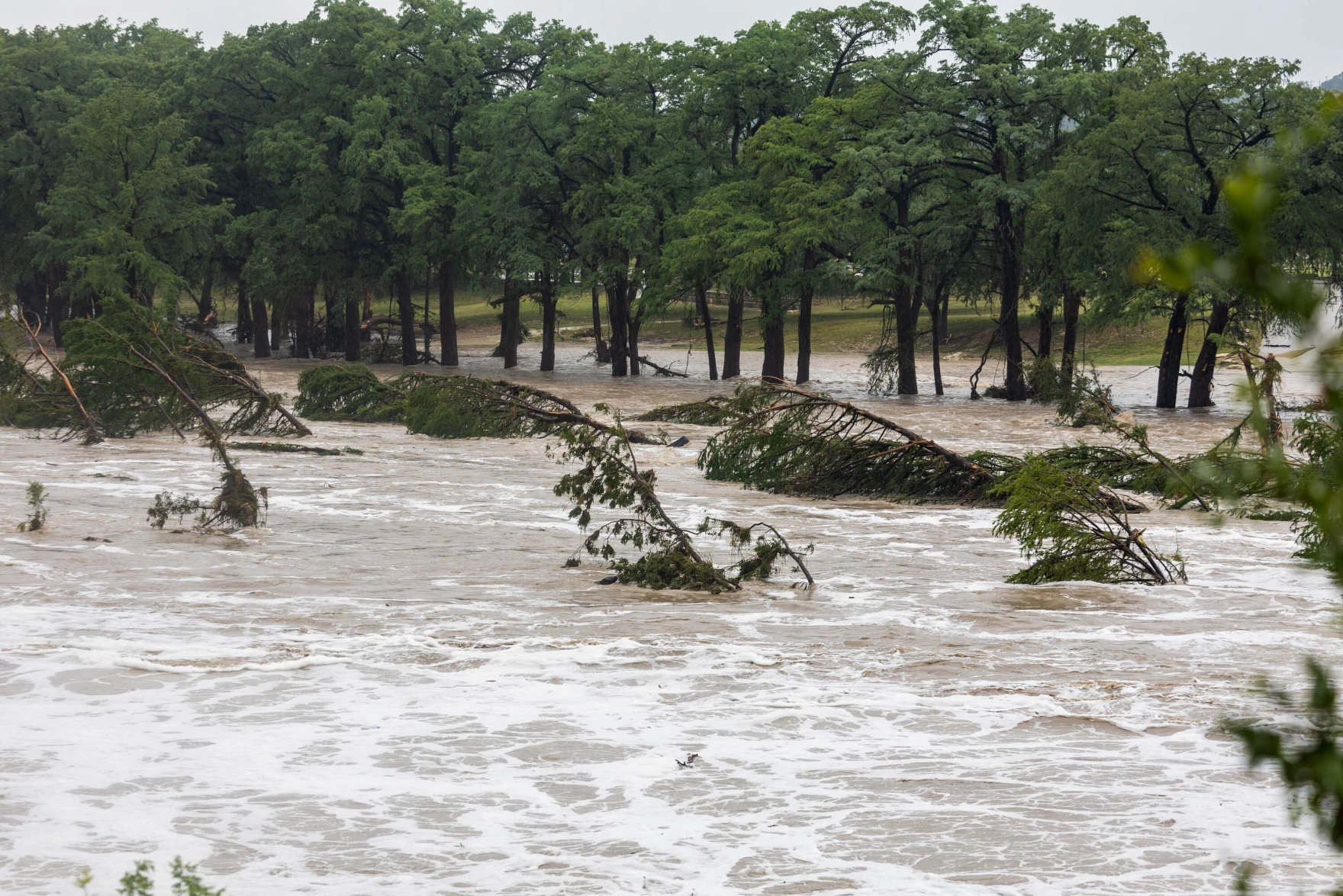 At least 1 summer camp evacuates, others monitoring as life-threatening floods strike the Hill Country